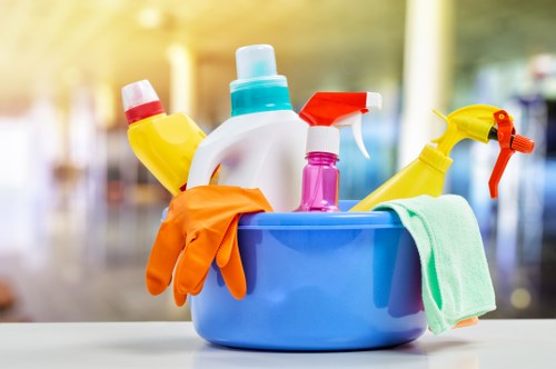 A cleaner working in a Dulwich commercial property with careful access